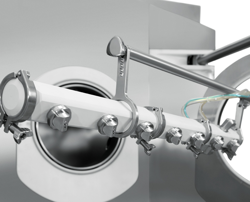 View of ACCELA COTA PRO tablet coating machine with spray bar