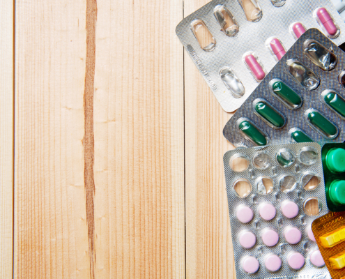 View of different types of tablets and capsules in blister packaging
