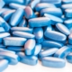 Close up view of blue-coated tablets